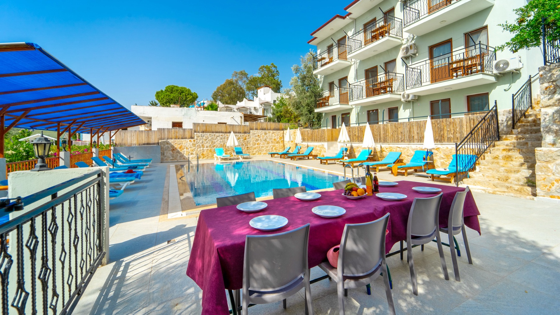 Pool terrace and sunbed area